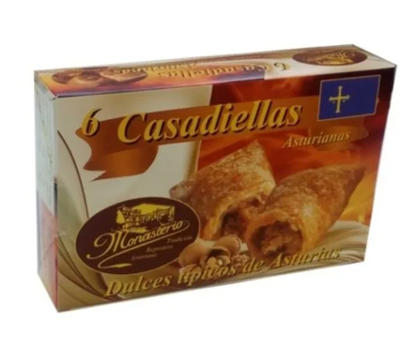 Caja de 6 casadiellas asturianas, un dulce típico de Asturias, con un diseño atractivo que incluye el logo de la marca Monasterio y la bandera de Asturias. Ideal para disfrutar como postre o merienda.